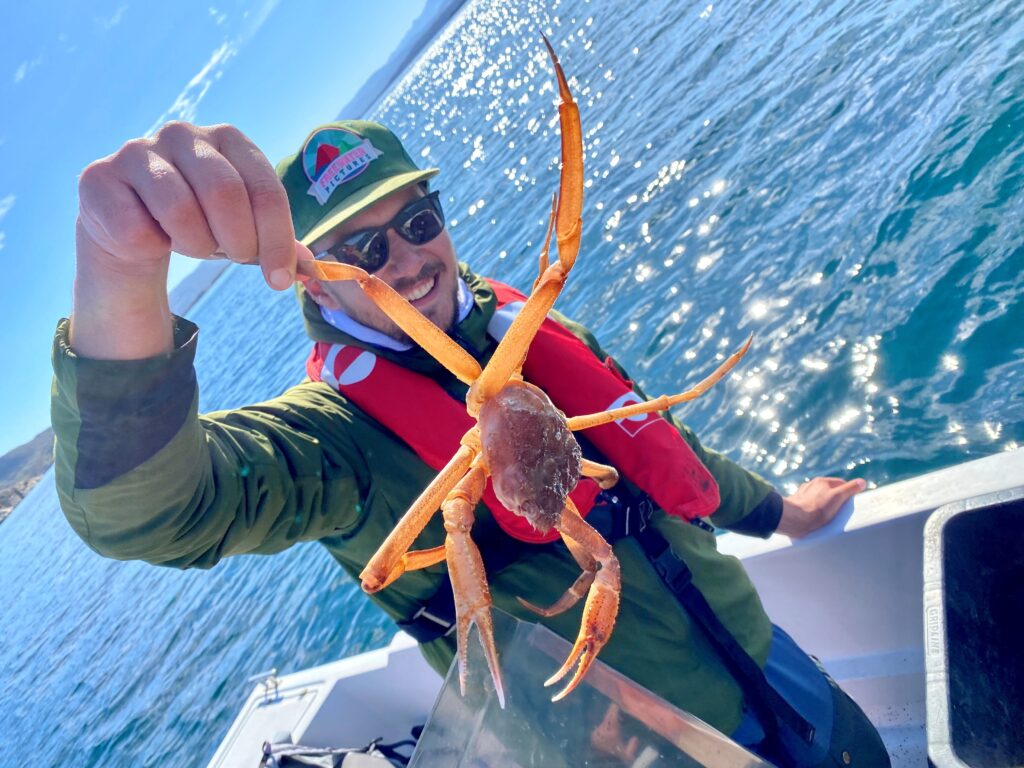 Holding a snow crab in Greenland. Photo by Andreas Stocker